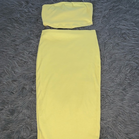 yellow two piece skirt and top